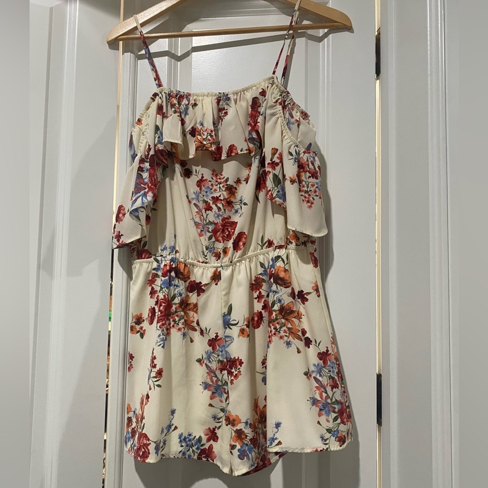 Floral romper. Cold shoulder. Spaghetti strap. Worn once.